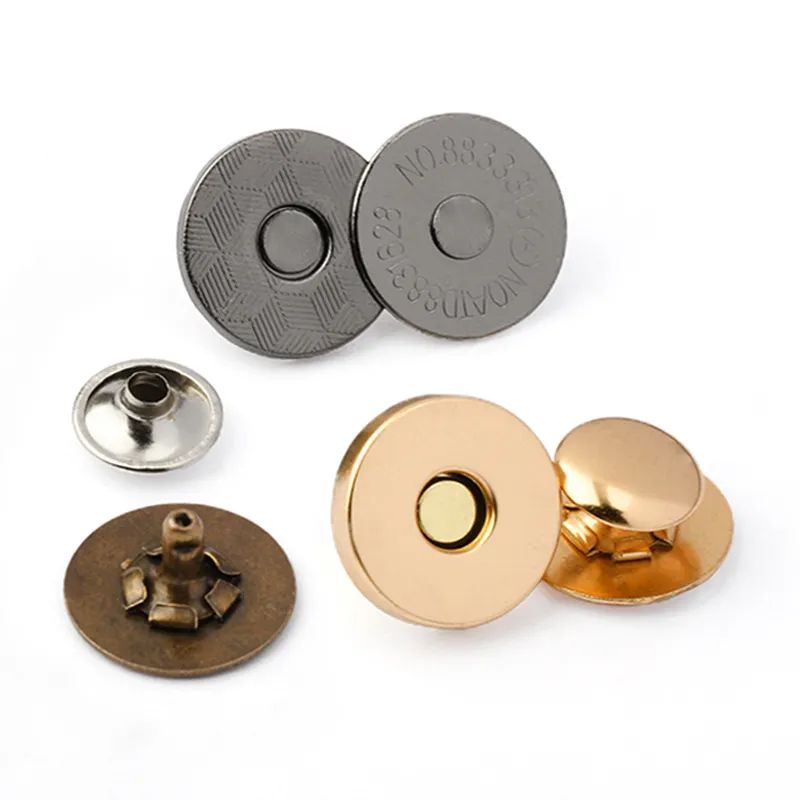 Assorted metal snap button closures in gold, bronze, and silver tones, designed for bags, wallets, and accessories fastening.