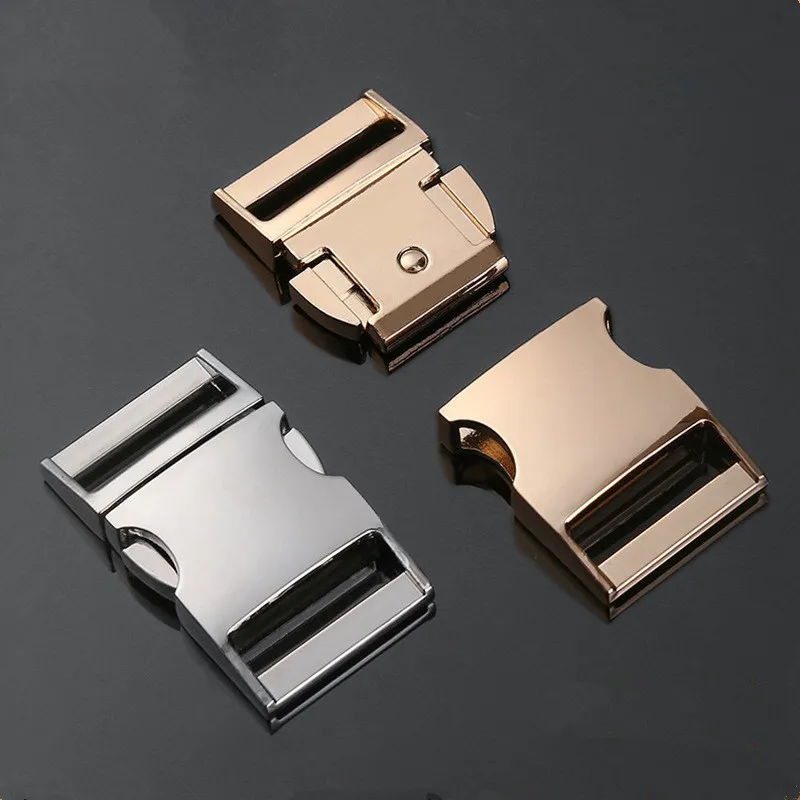 A set of three metallic side-release buckles in silver, gold, and rose gold finishes displayed on a dark background. These sturdy and stylish buckles are designed for use in bags, belts, and straps, featuring a sleek design with a secure locking mechanism for durability and ease of use.
